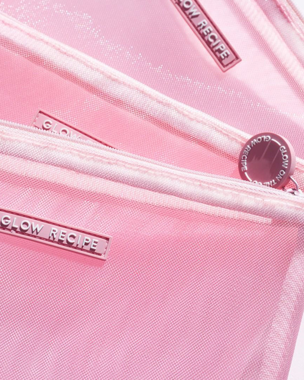 close shot of pink mesh zips