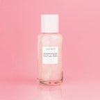 Mini Watermelon Glow PHA + BHA Pore-Tight Toner bottle from the Real Glass Skin Kit shown on a pink background.