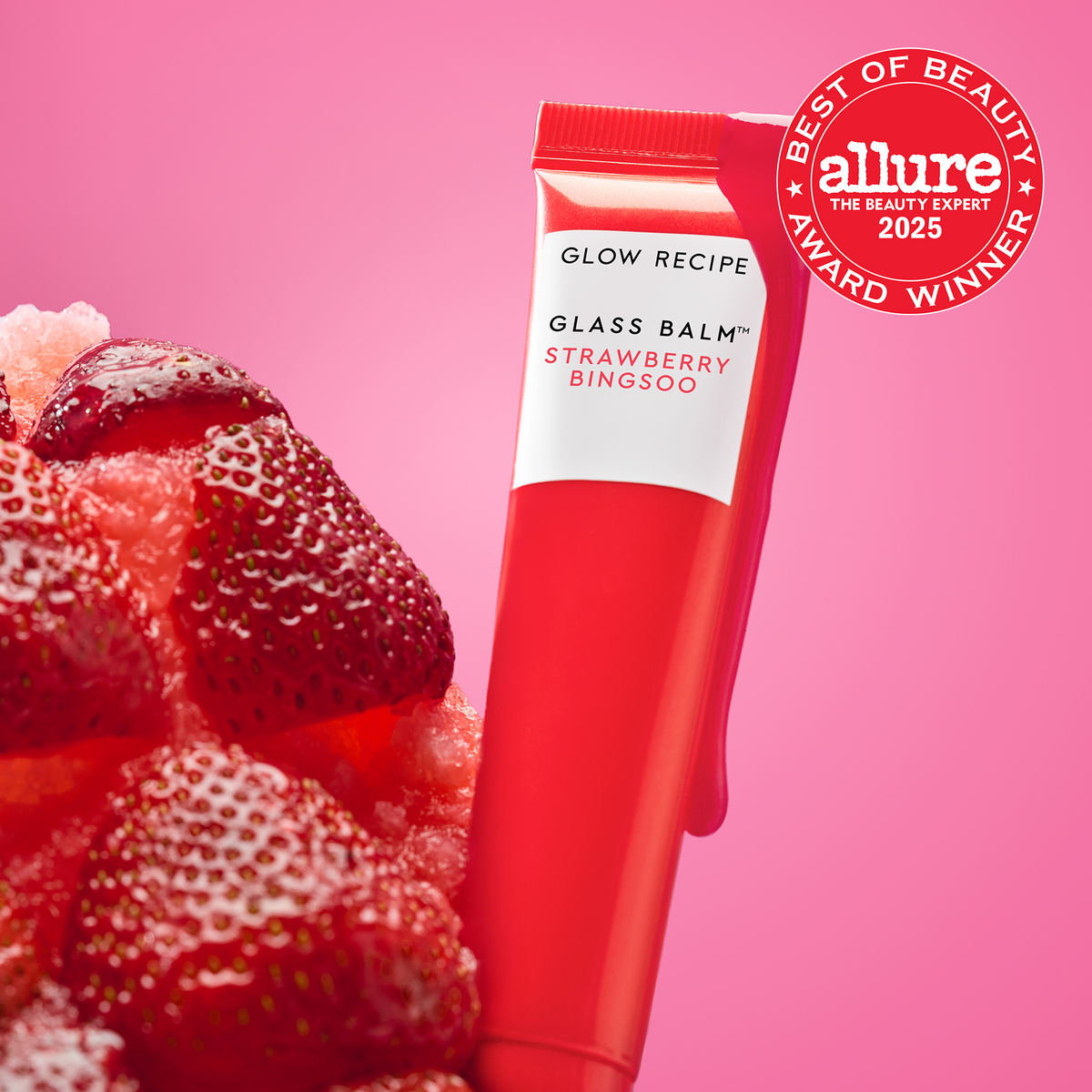Allure Best of Beauty seal badge over the Glass Balm tube in Strawberry Bingsoo, a sheer pinky-red shade.